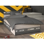 Kinderbed Fabric van Parisot met twee grote, uitschuifbare opberglades voor speelgoed of beddengoed.