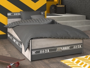 Kinderbed Fabric van Parisot met twee grote, uitschuifbare opberglades voor speelgoed of beddengoed.